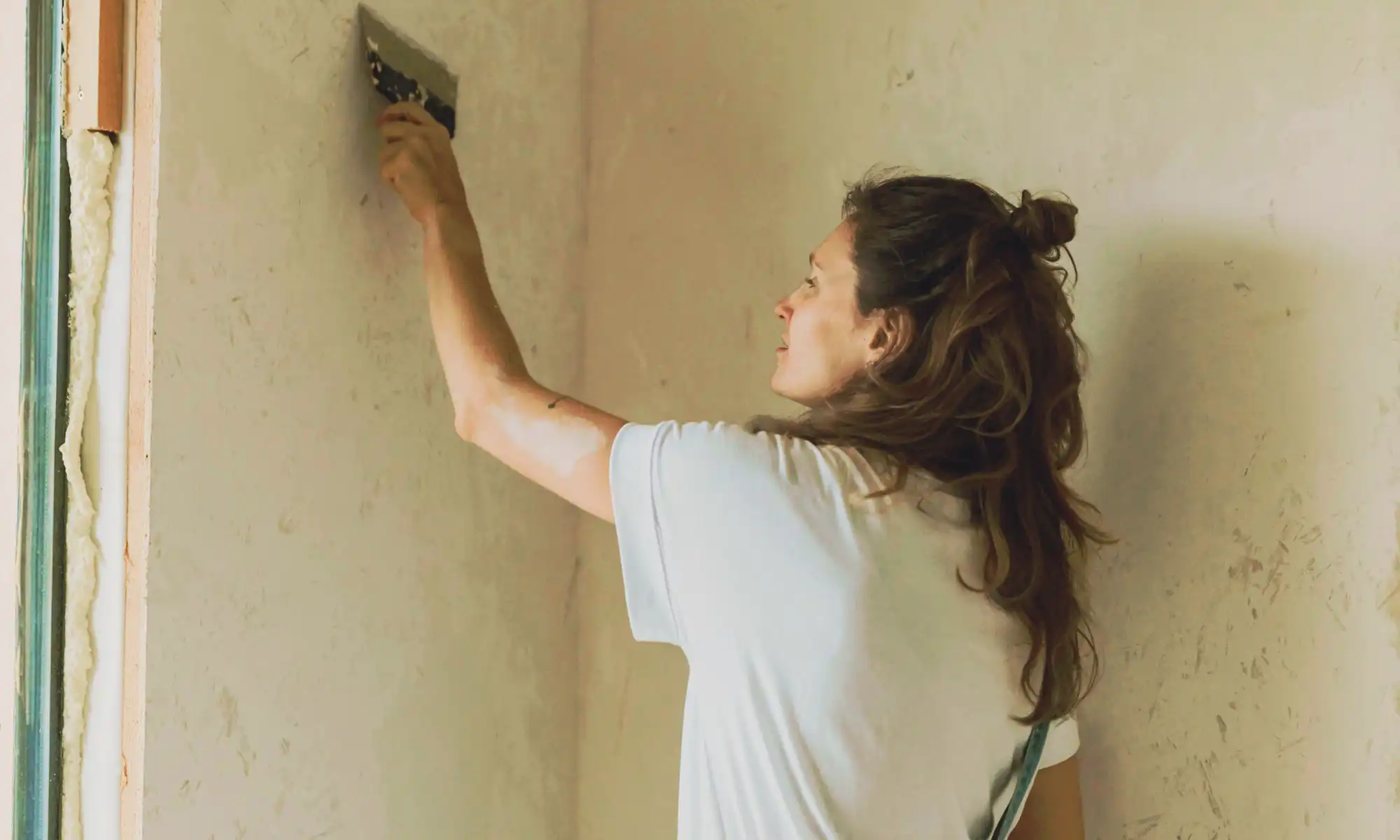 nancy-fixing-wall.webp nancy-fixing-wall.webp