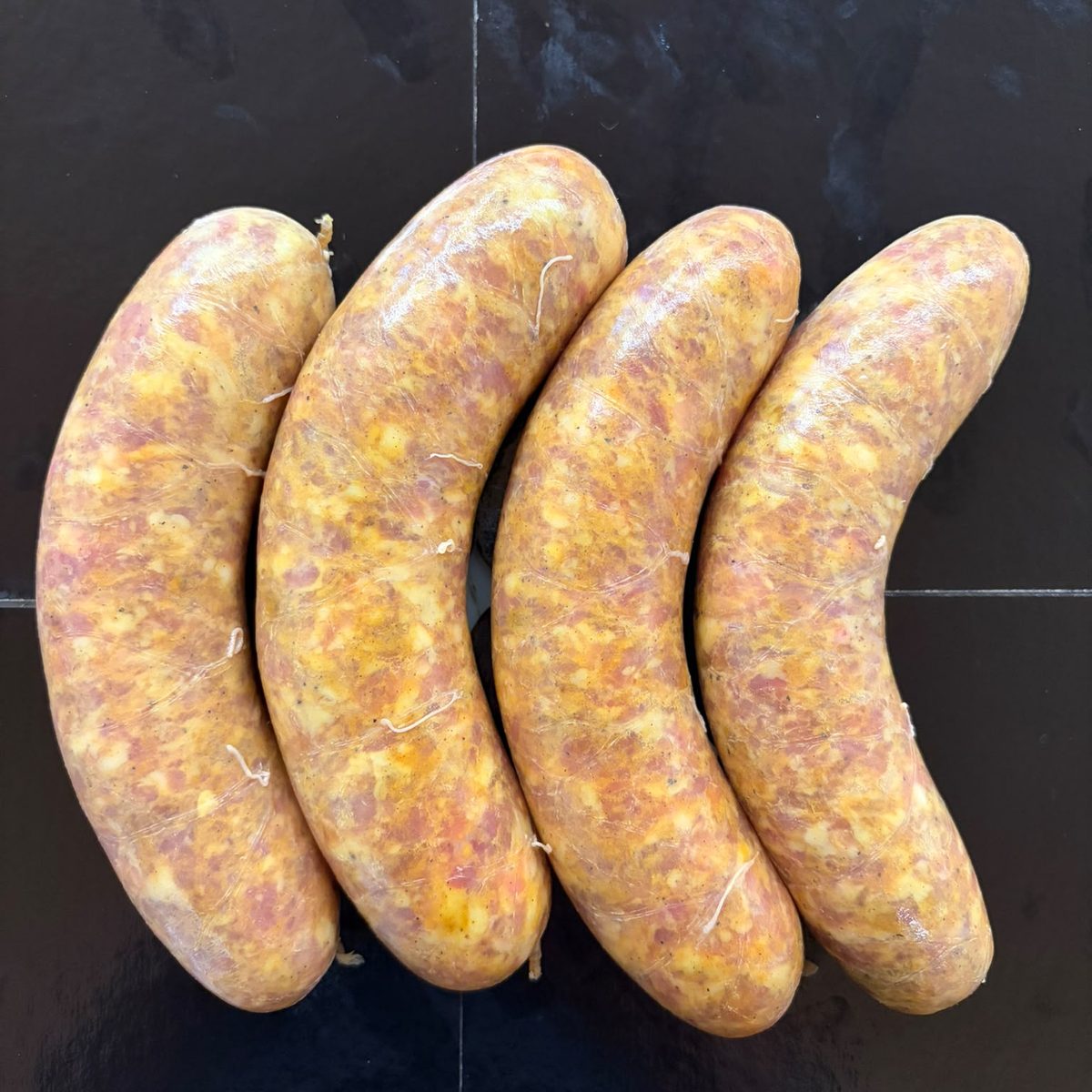 Saucisses à l'indienne de la ferme, paquet de 4
